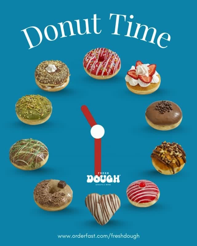 A ring of Fresh Dough donuts arranged like a clock